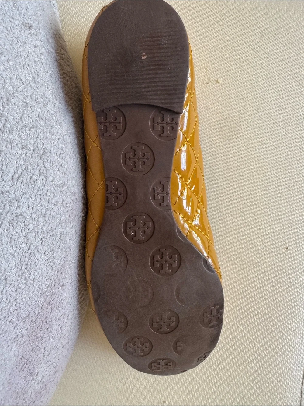 Tory Burch Quilted Mustard Leather Reva Flats with Logo Medallion